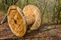 An empty cable reel is left on site. The problem of ecology Royalty Free Stock Photo