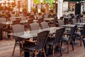 Empty cafe on the street, empty tables and chairs Royalty Free Stock Photo