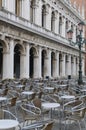 Empty cafe tables and chairs in San Marco Square, Venice, Veneto, Italy, Europe Royalty Free Stock Photo