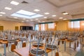 Empty cafeteria with chairs on the tables