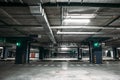 Empty car parking garage underground interior inside in apartment building or in mall or supermarket Royalty Free Stock Photo