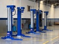 Empty car repair station with blue hydraulic lift