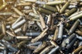 Empty carbine or rifle cartridges. A large number of cases. Background of brass ammunition cartridges to illustrate armed conflict Royalty Free Stock Photo