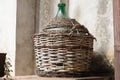 Empty carboy in rustic house