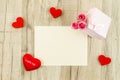 Empty card with rose flower, gift box and heart Royalty Free Stock Photo