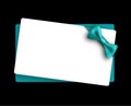 Empty card with turquoise bow on black background