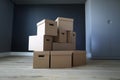 Empty cardboard boxes stand in an empty room