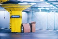 Empty cardboard boxes in underground garage parking lot Royalty Free Stock Photo