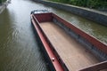 Empty cargo boat on river Meuse