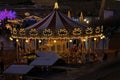 Empty carousel horses during traditional Maltese Christmas market on Triton square