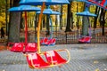 Empty Carousel With Seats Suspended On Chains Without People Wa Royalty Free Stock Photo