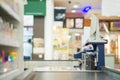 Empty cash desk with conveyor belt and computer terminal in supermarket Royalty Free Stock Photo