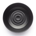 An empty ceramic black bowl for mockup. Top lighting.