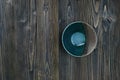 Empty ceramic bowl on wooden table