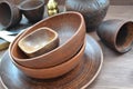 Empty ceramic dishware, silver and wooden objets