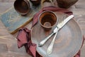 Empty ceramic dishware and wooden objets flat view