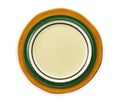 Empty ceramic plate with green and yellow edge, isolated on white background with clipping path, Top view Royalty Free Stock Photo