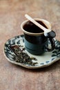 Empty Ceramic Tea Cup and Green Tea Leaves. Symbolic image. Asian culture.