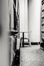 Empty Chair and Desk in a Quiet Library Nook Royalty Free Stock Photo