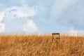 Empty chair in meadow. Field with dry grass. Summer or autumn season. Camping and adventure time concept. Copy space Royalty Free Stock Photo