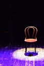 A chair in the spotlight