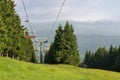 Empty chairlift in Jesenik mountains, ski lift pylon in summer day Royalty Free Stock Photo