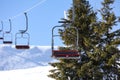 Empty chairlift at mountain ski resort. Winter Royalty Free Stock Photo