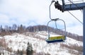 Empty chairlift at mountain ski resort. Winter Royalty Free Stock Photo