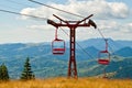 Empty chairlift in the mountains Royalty Free Stock Photo