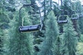 Empty chairlifts in mountain landscape