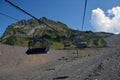 Empty chairlifts moving in the mountains