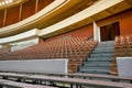 Empty chairs and benches in the auditorium. Concept: lack of interest, failure, boycott