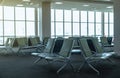 Empty chairs in departure lounge or terminal at the airport Royalty Free Stock Photo