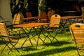 Empty chairs and desks of a garden restaurant Royalty Free Stock Photo