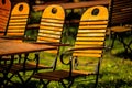 Empty chairs and desks of a garden restaurant Royalty Free Stock Photo