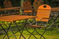 Empty chairs and desks of a garden restaurant Royalty Free Stock Photo