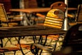 Empty chairs and desks of a garden restaurant Royalty Free Stock Photo