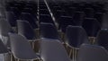 Empty chairs in the hall Empty movie theater Dark background Interior design.