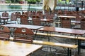 Empty chairs and tables in an attractive outdoor restaurant on the banks of the rhine, staff shortage after the corona pandemic