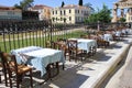 Empty chairs and tables of a traditional restaurant in Athens, Greece Royalty Free Stock Photo