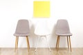 Empty chairs. Vacant job position concept. Minimlistic interior lofty room with elegant furniture pieces.