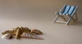 An empty chaise longue and a seashell . Summer concept, tourism, pandemic, coronavirus Royalty Free Stock Photo