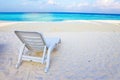 Empty chaise lounge before ocean Royalty Free Stock Photo