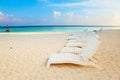 Empty chaise lounge before ocean, sunrise Royalty Free Stock Photo