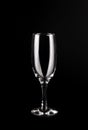 Empty champagne glass on a black background. Royalty Free Stock Photo