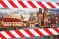 Empty Charles Bridge and Lesser Town Bridge Tower in Prague Czech Republic with warning tape