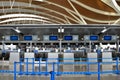 Empty check in counters at Shanghai Pudong International Airport China