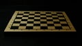 Empty chess board as wide angle in dark environment Royalty Free Stock Photo