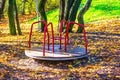 empty children carousel on a playground Royalty Free Stock Photo