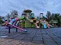 Children playground in park - bad weather